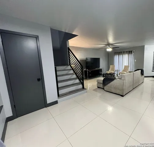a kitchen with a sink stainless steel appliances and cabinets