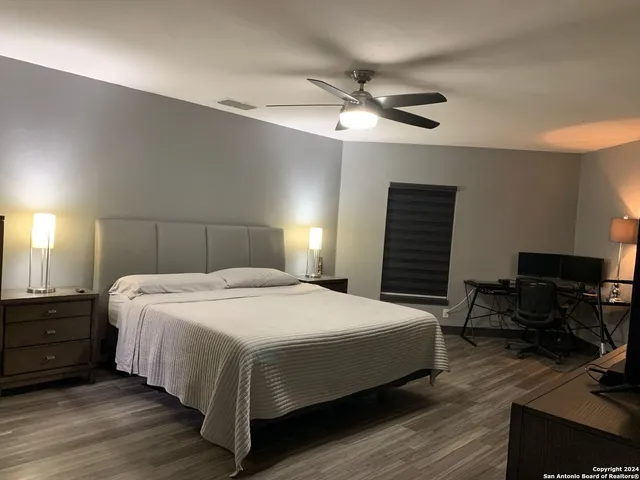 a bathroom with a shower and a toilet