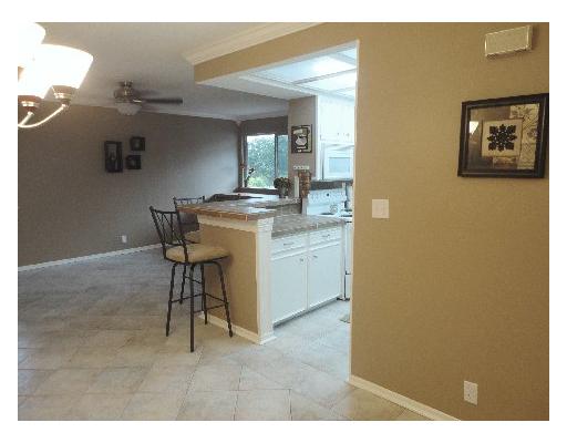 1917 Hidden Way Corpus Christi, TX 78412 - Photo 10 of 10 a view of a kitchen with furniture and a window