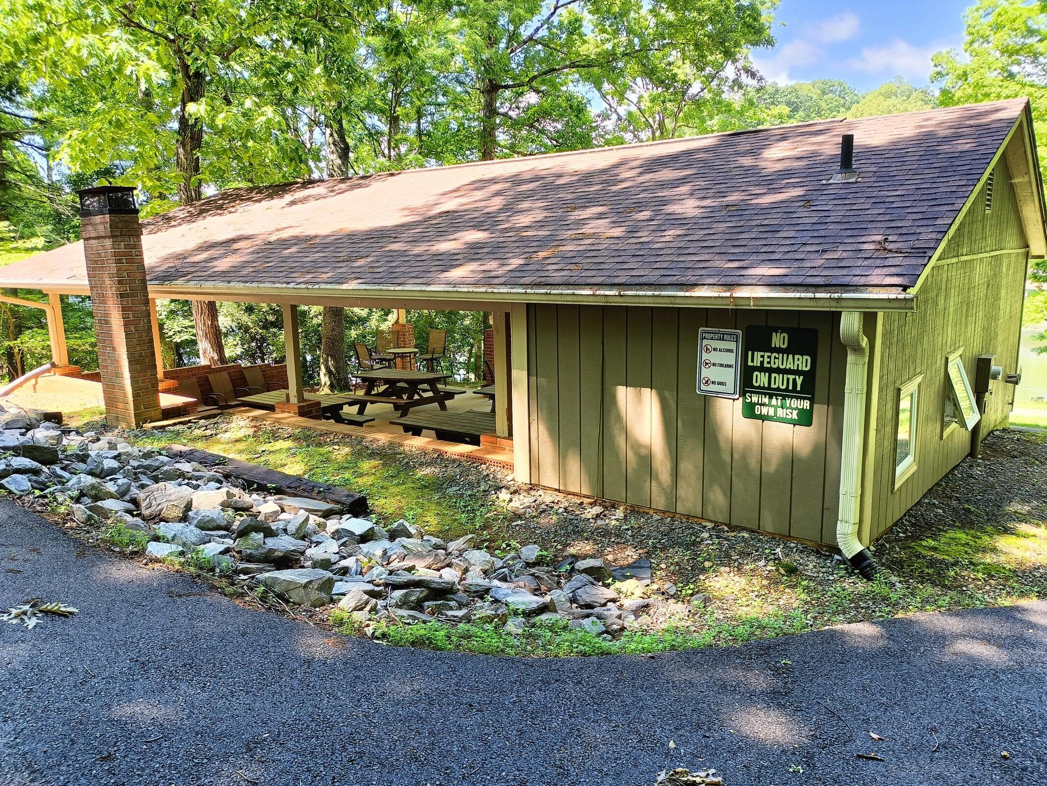 Lot 59 Old Barn Road Moneta, VA 24121 - Photo 6 of 14 a front view of a house with a yard