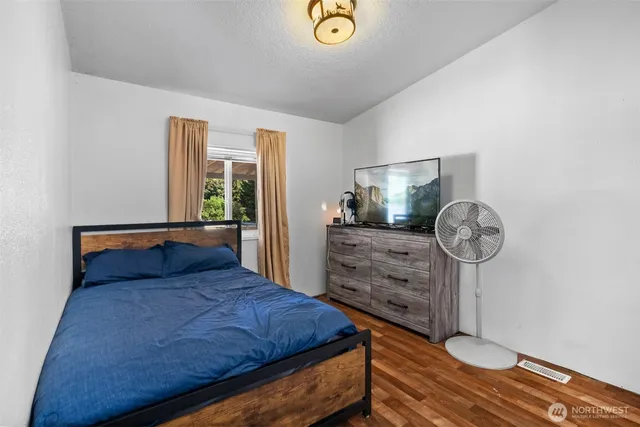 a backyard of a house with lots of green space