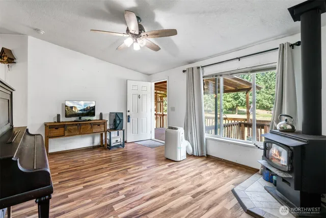 a view of livingroom with furniture wooden floor and window