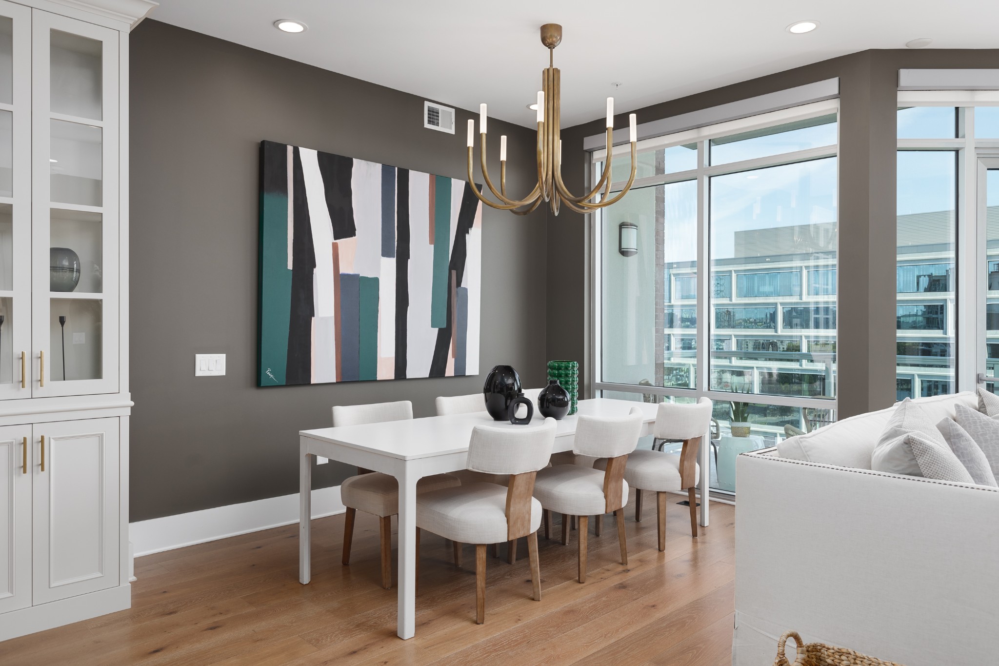 20 Rutledge Street, Unit 505 Nashville, TN 37210 - Photo 11 of 67 a view of a dining room with furniture window and wooden floor