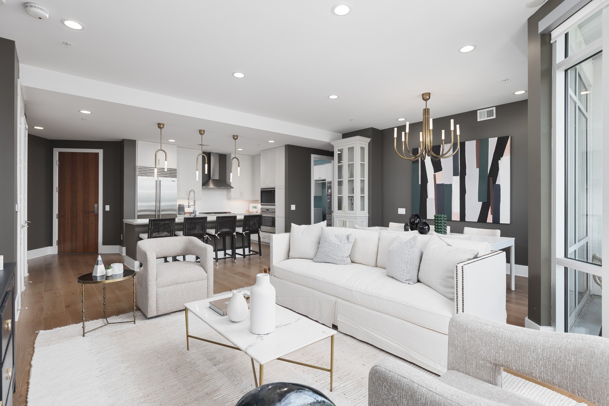 20 Rutledge Street, Unit 505 Nashville, TN 37210 - Photo 12 of 67 a living room with furniture and a large window