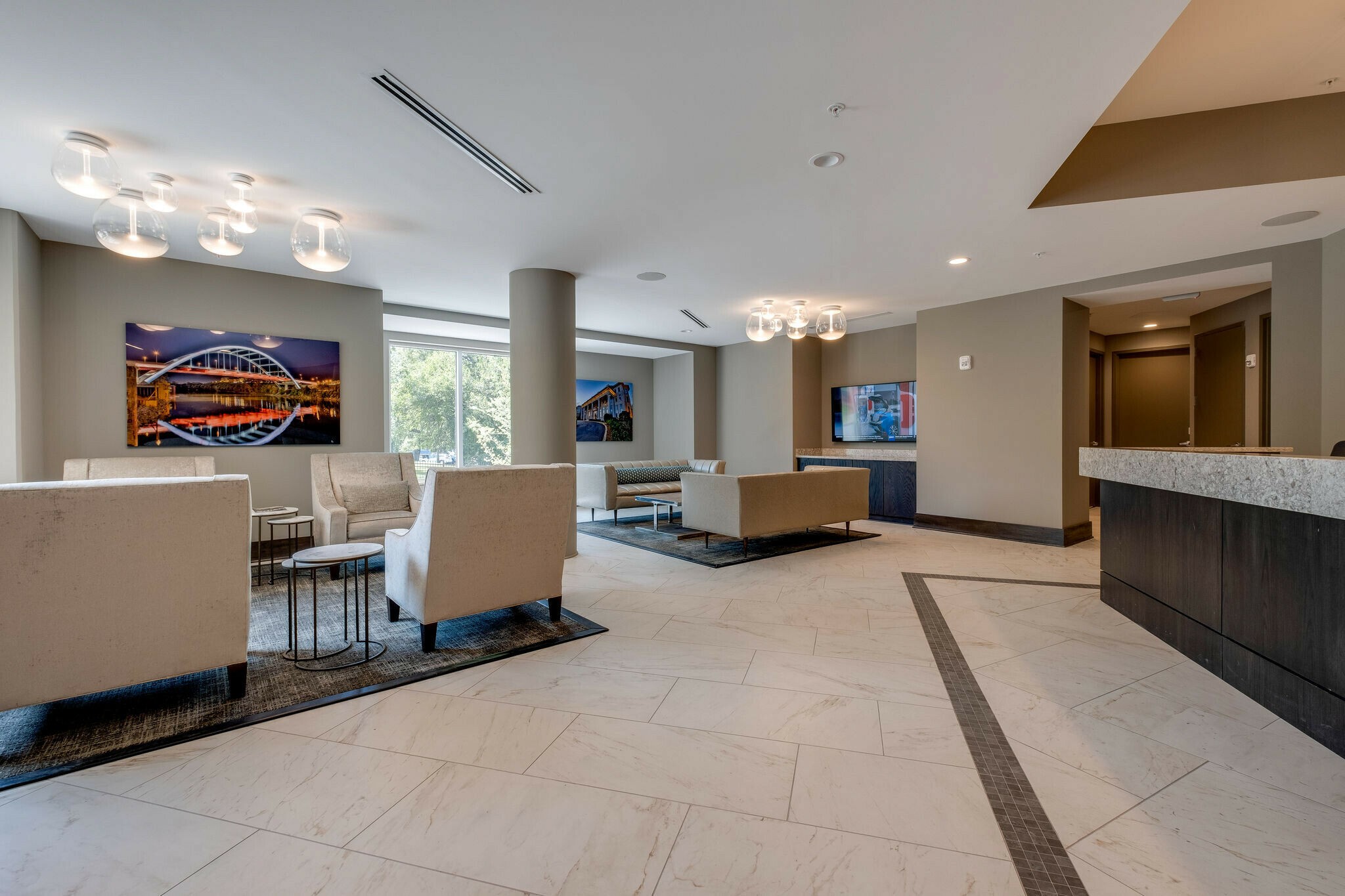 20 Rutledge Street, Unit 505 Nashville, TN 37210 - Photo 39 of 67 a living room with furniture and a flat screen tv