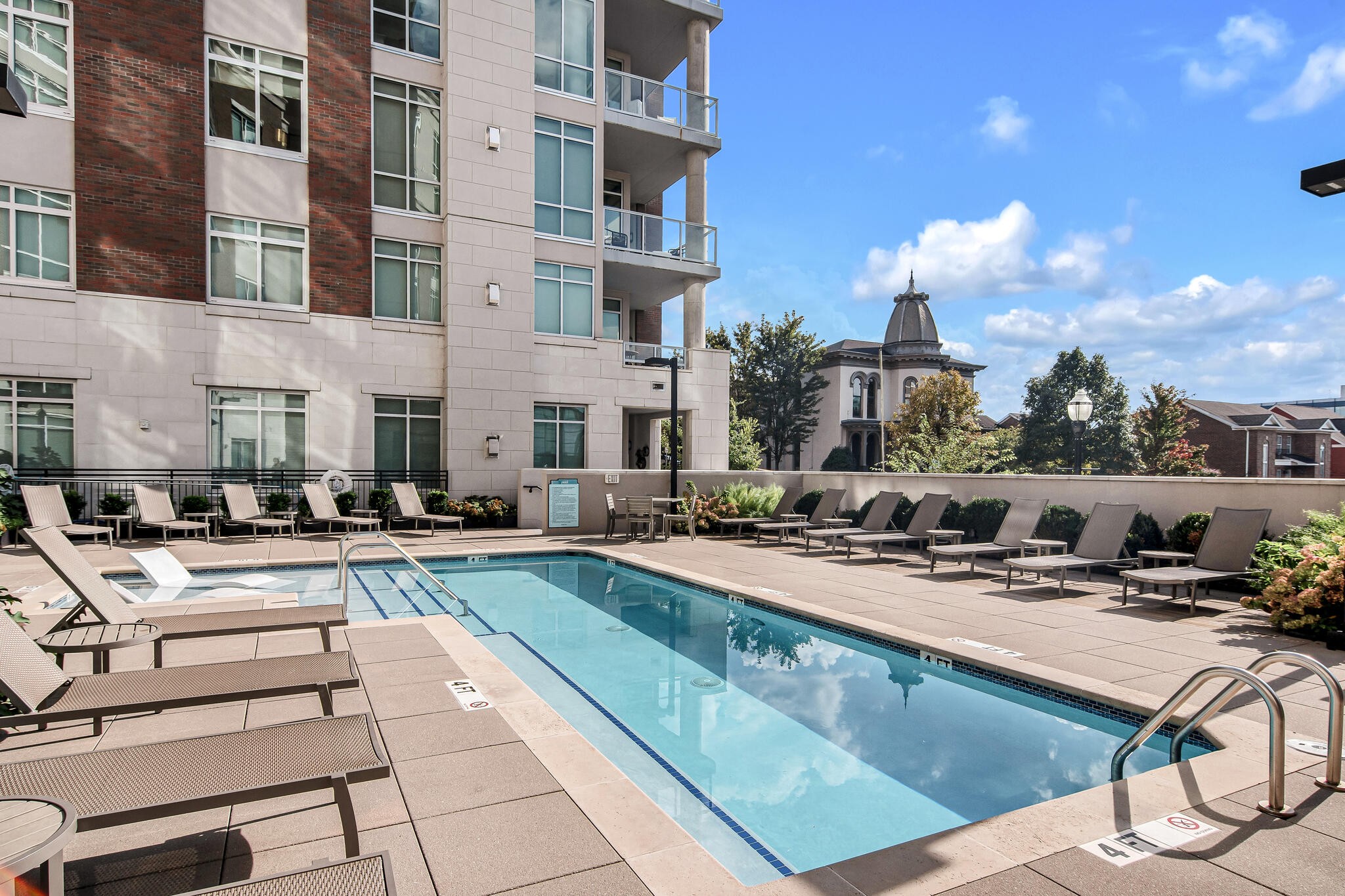 20 Rutledge Street, Unit 505 Nashville, TN 37210 - Photo 47 of 67 a view of a house with swimming pool and sitting area