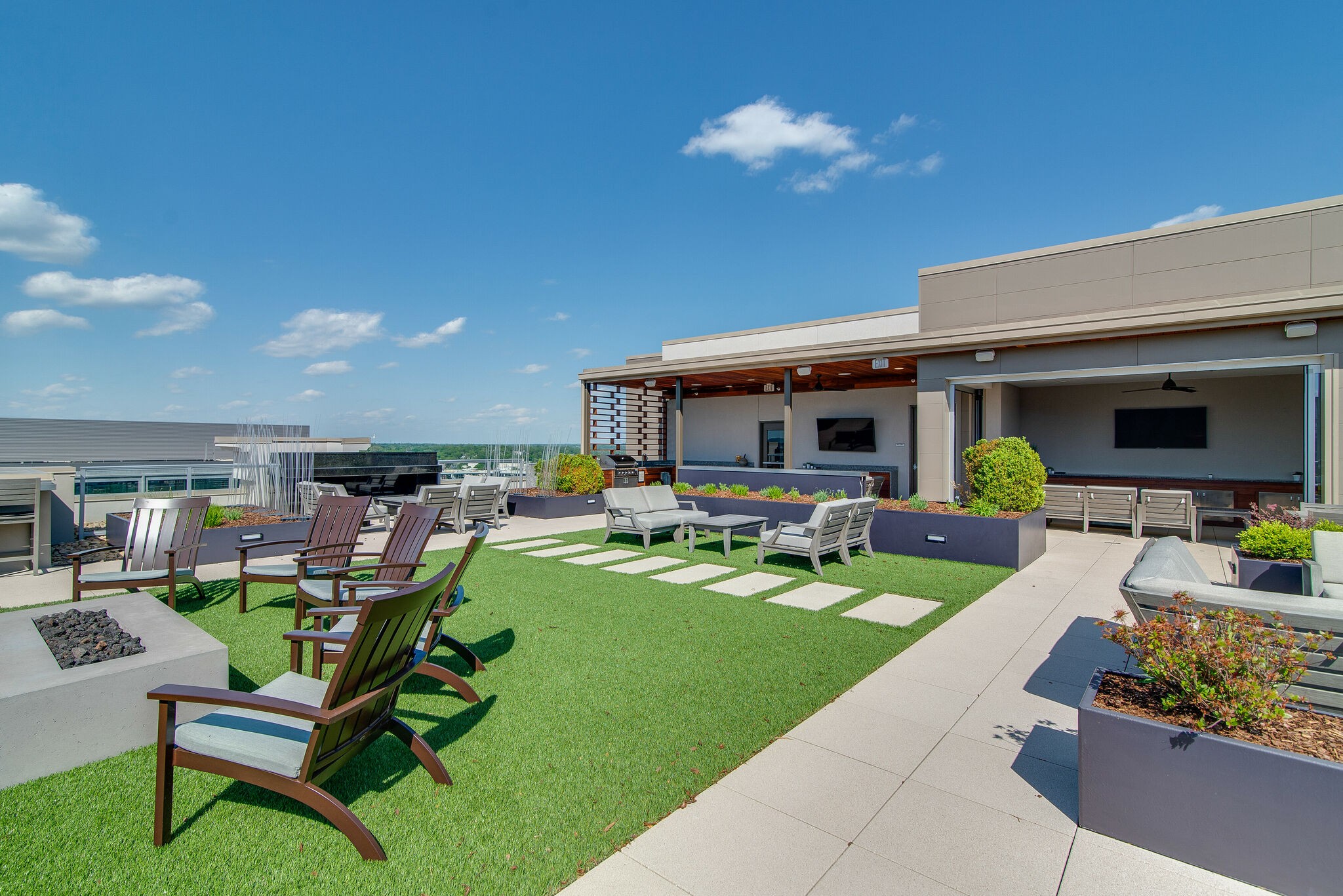 20 Rutledge Street, Unit 505 Nashville, TN 37210 - Photo 67 of 67 a view of a house with backyard porch and sitting area