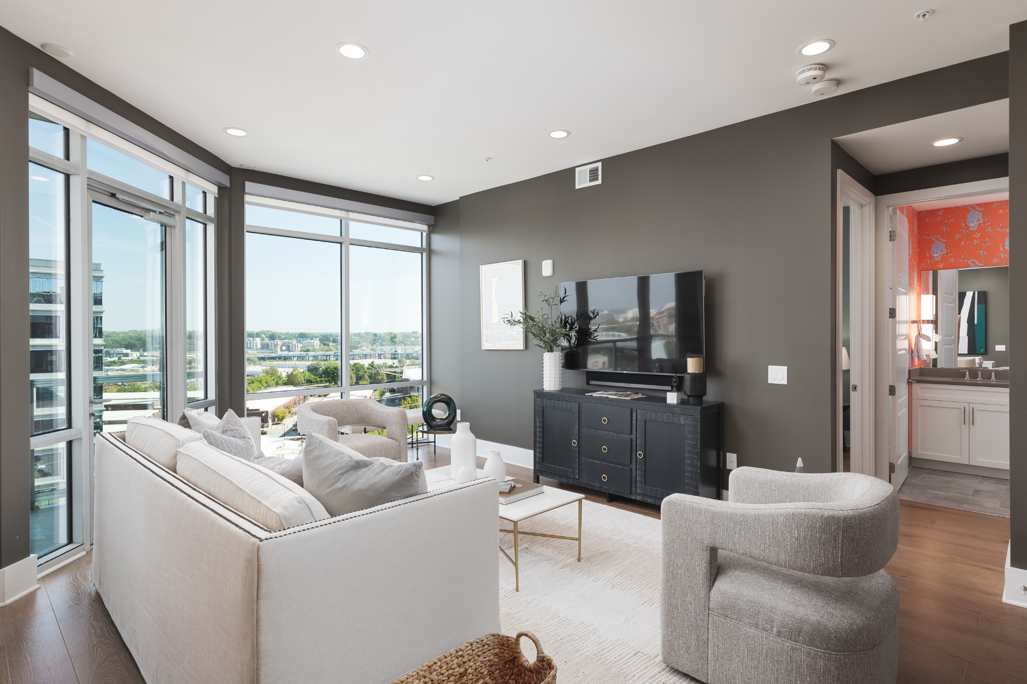 20 Rutledge Street, Unit 505 Nashville, TN 37210 - Photo 10 of 67 a living room with furniture and a large window