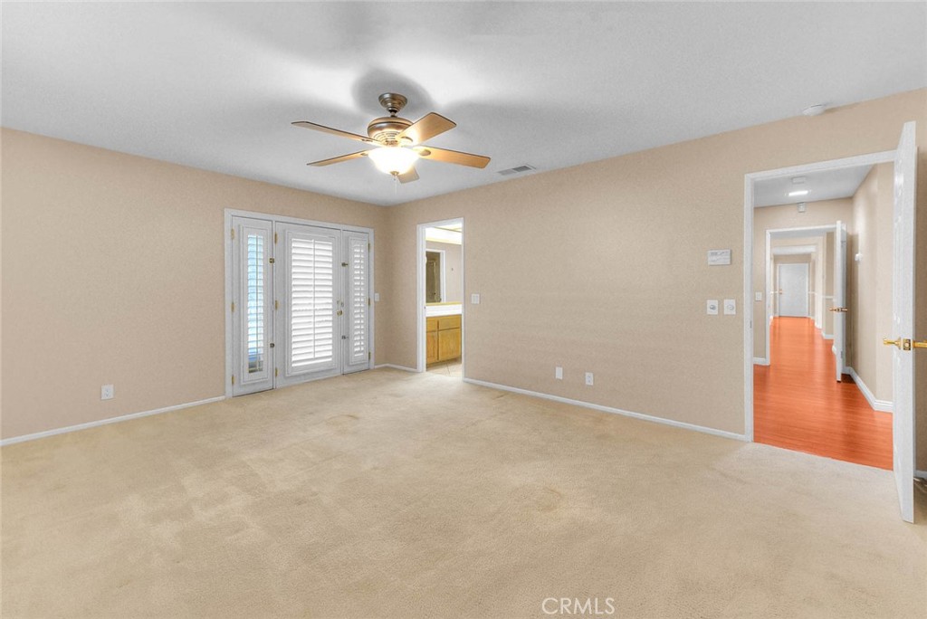 30673 Del Rey Road Temecula, CA 92591 - Photo 28 of 47 Opposite View With Hallway To Right And Doorway To Ensuite Bathroom.