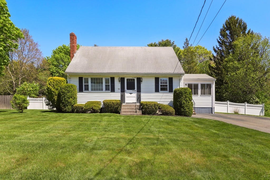 54 Chisholm Road Stoughton, MA 02072 - Photo 1 of 33 a front view of a house with a garden