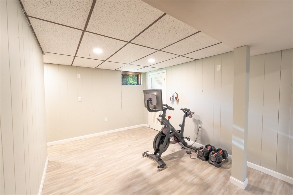 54 Chisholm Road Stoughton, MA 02072 - Photo 26 of 33 a view of a room with gym equipment