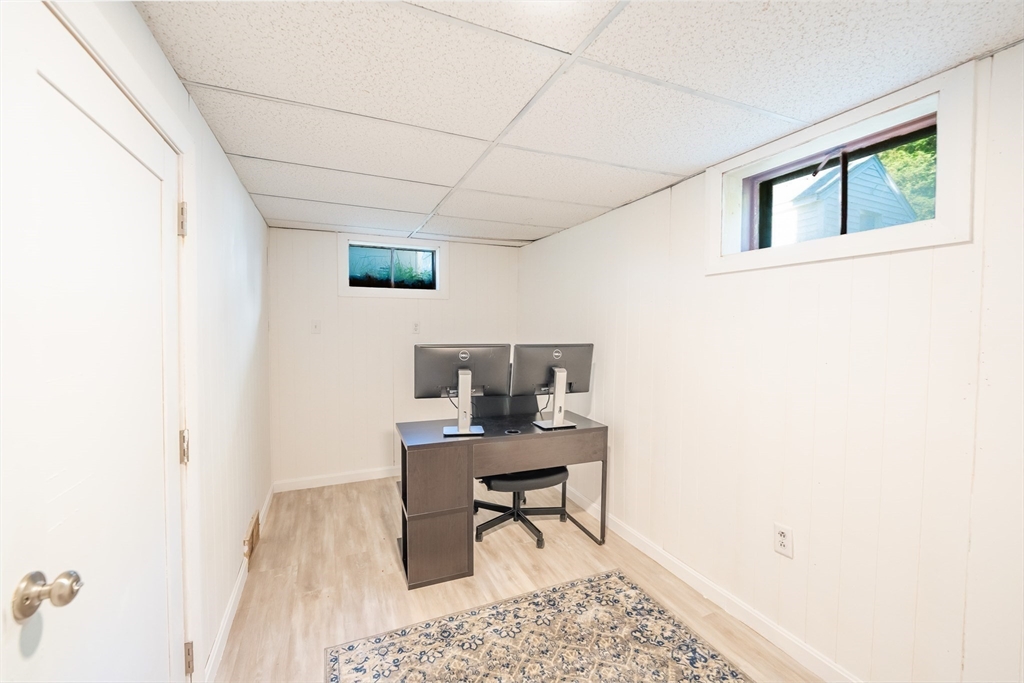 54 Chisholm Road Stoughton, MA 02072 - Photo 28 of 33 a workspace with furniture and window