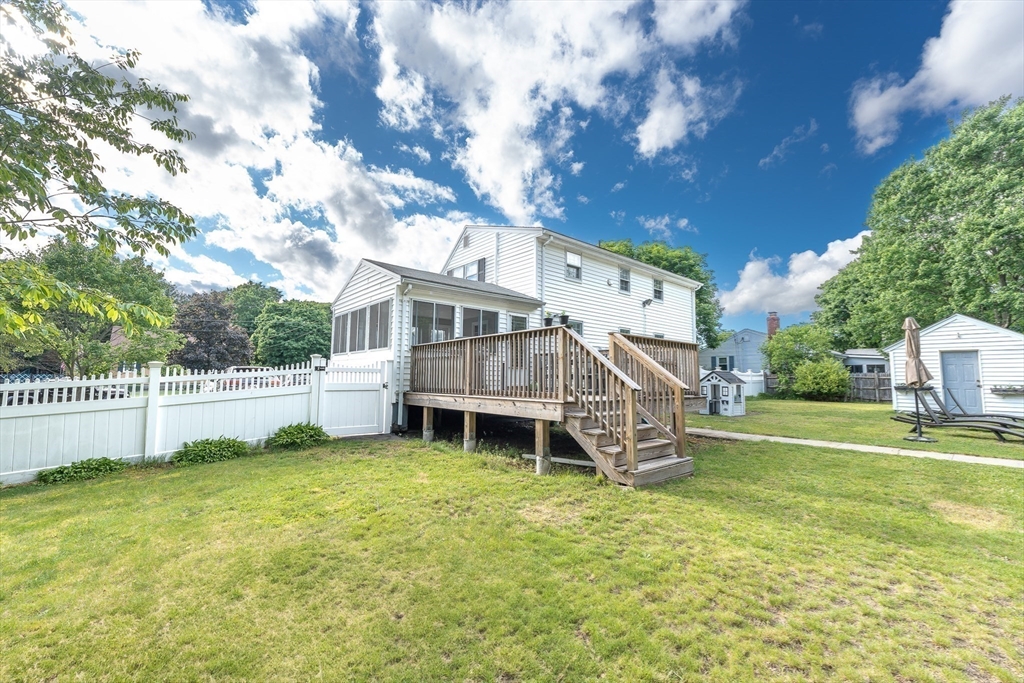54 Chisholm Road Stoughton, MA 02072 - Photo 29 of 33 a view of a house with a yard balcony and sitting area