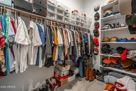 a bathroom with a shower and a glass door