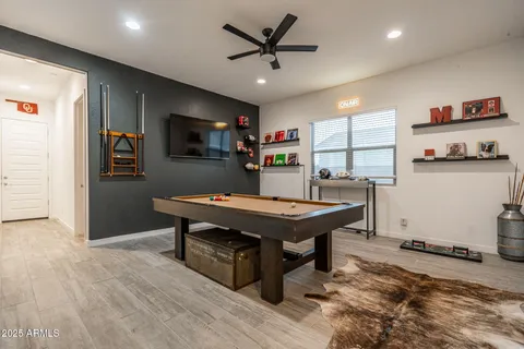 a bathroom with a sink toilet and a mirror