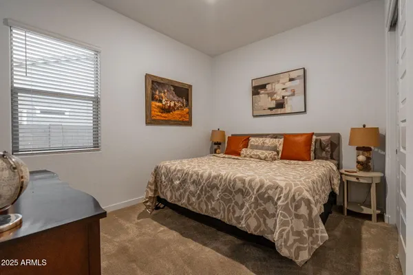 a room with furniture and a flat screen tv