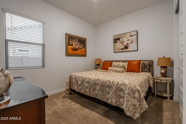 a room with furniture and a flat screen tv