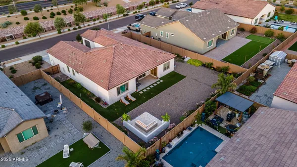 a view of a back yard of the house