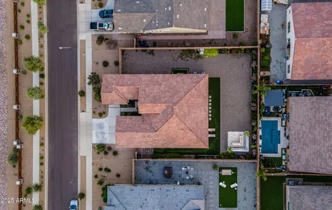 an aerial view of a house with a garden