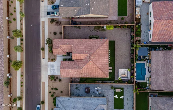 an aerial view of a house with a garden