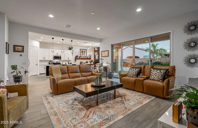 a room with furniture and potted plant