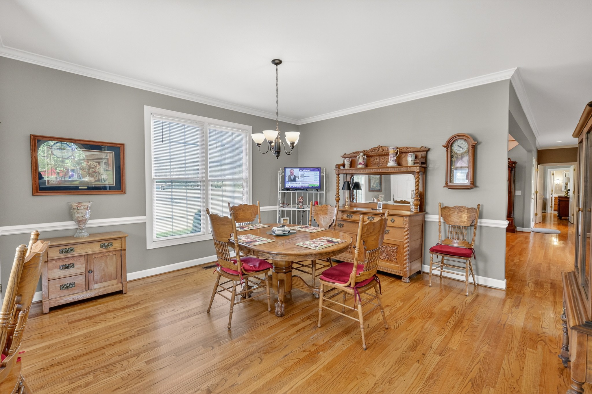 4676 Harpeth-Peytonsville Road Thompson's Station, TN 37179 - Photo 12 of 84 a view of a dining room with furniture window and wooden floor