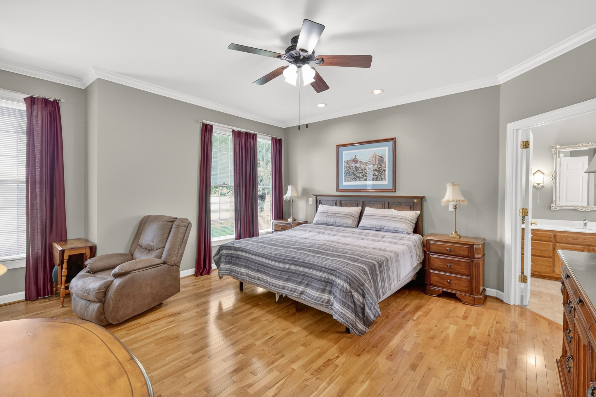 4676 Harpeth-Peytonsville Road Thompson's Station, TN 37179 - Photo 20 of 84 a bedroom with a large bed couch and a window