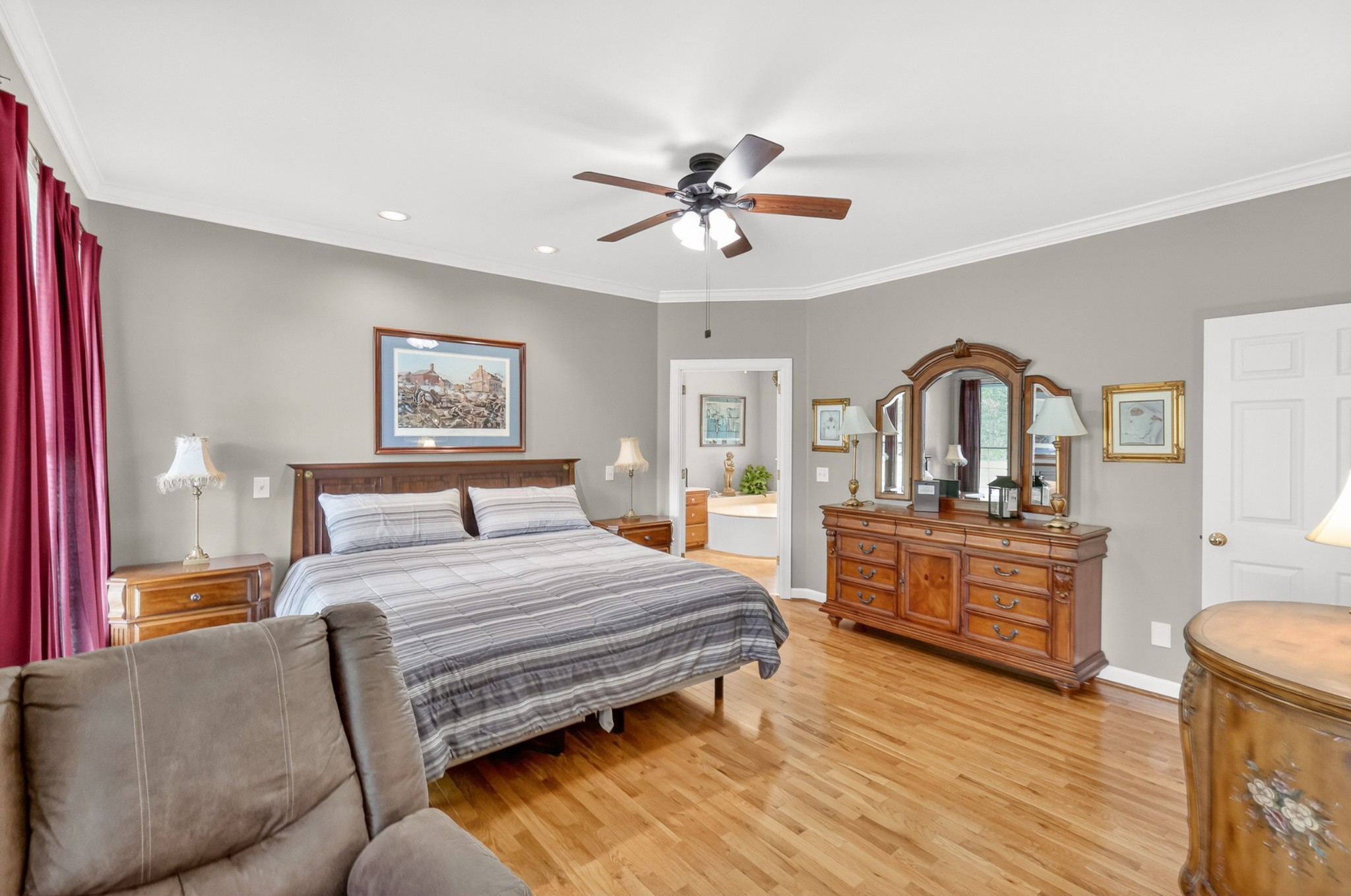 4676 Harpeth-Peytonsville Road Thompson's Station, TN 37179 - Photo 23 of 84 a bedroom with a large bed and a dresser
