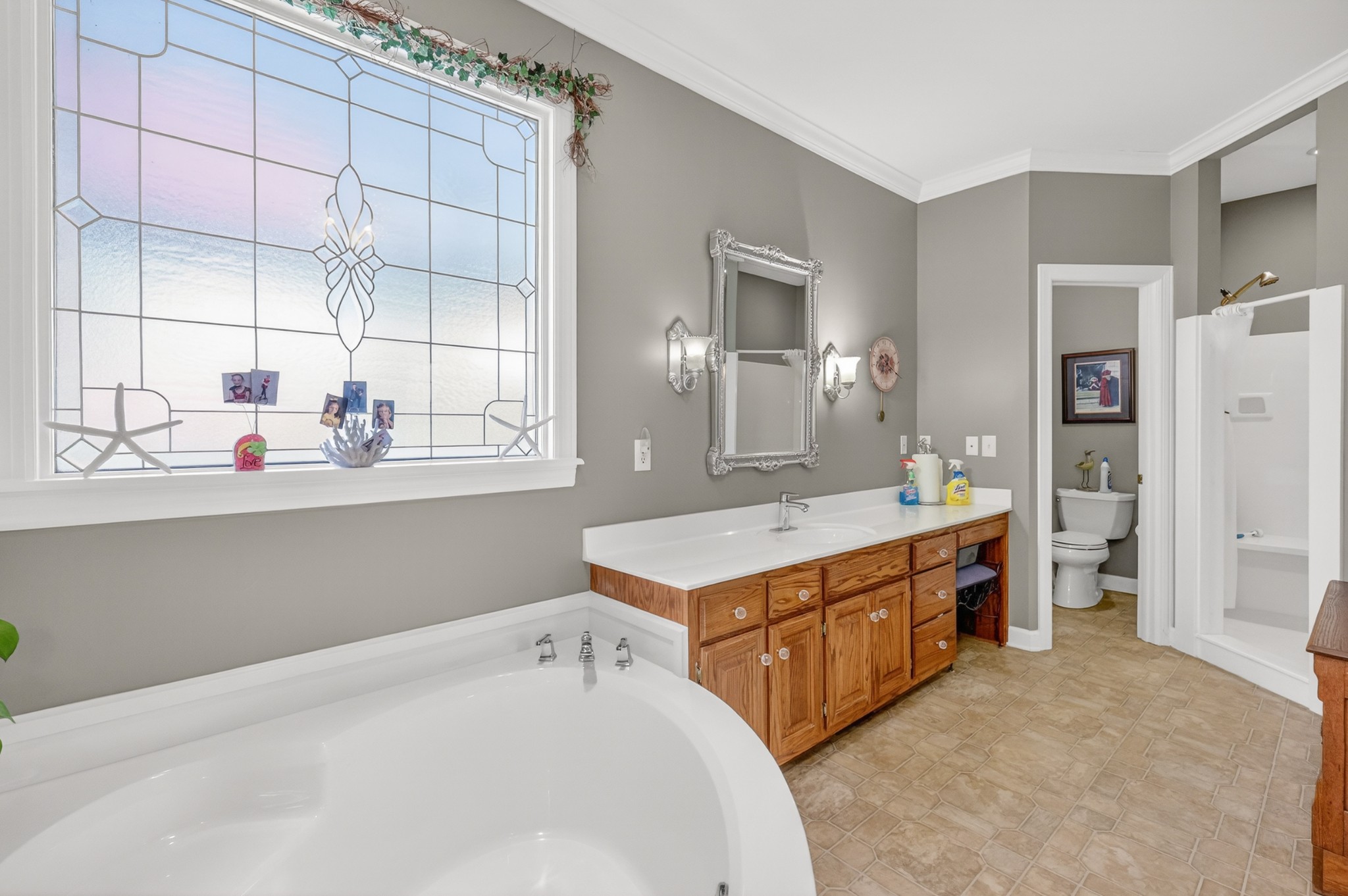 4676 Harpeth-Peytonsville Road Thompson's Station, TN 37179 - Photo 25 of 84 a kitchen with kitchen island a sink stove and refrigerator