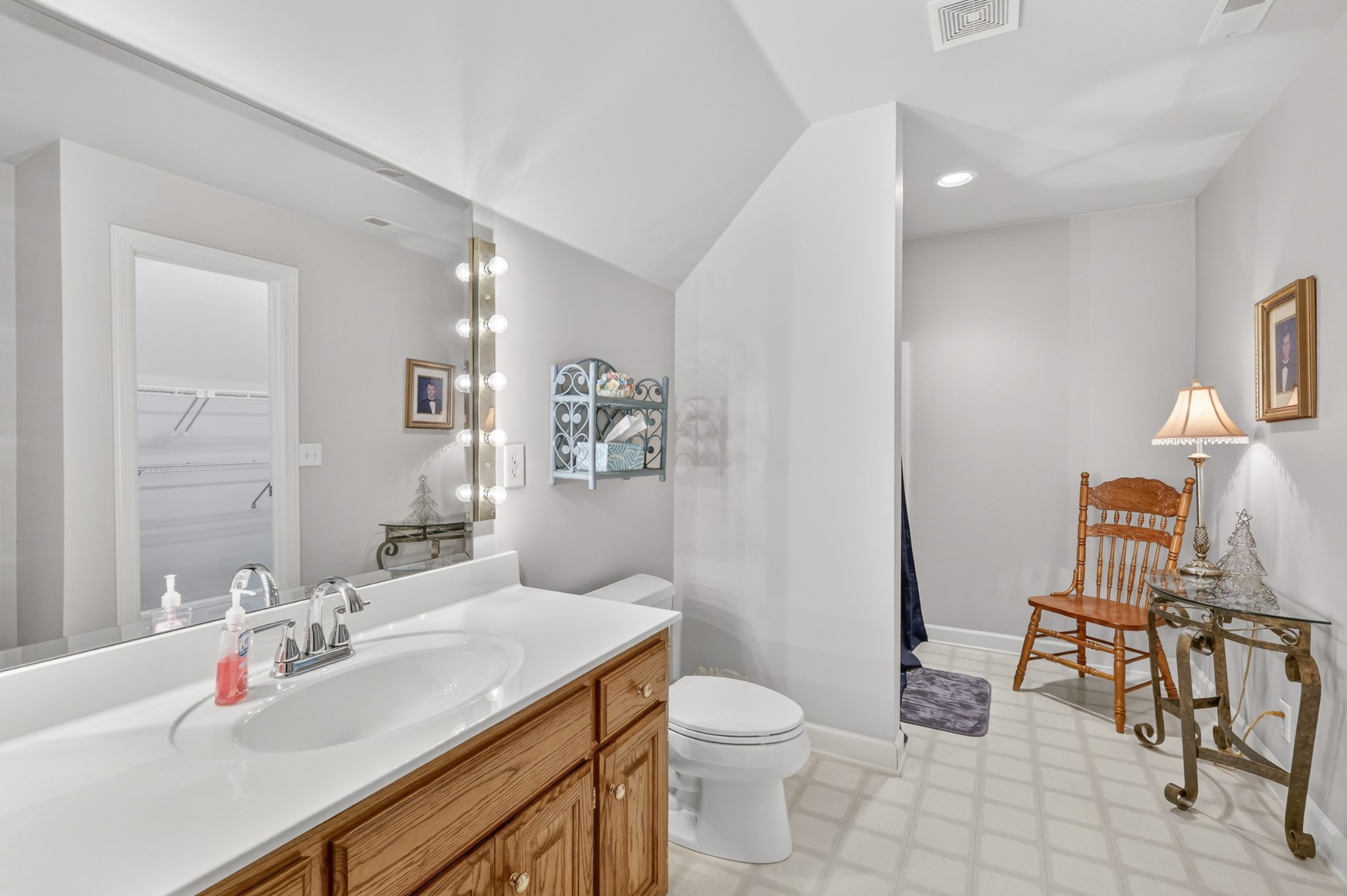 4676 Harpeth-Peytonsville Road Thompson's Station, TN 37179 - Photo 37 of 84 a bathroom with a sink toilet and a mirror