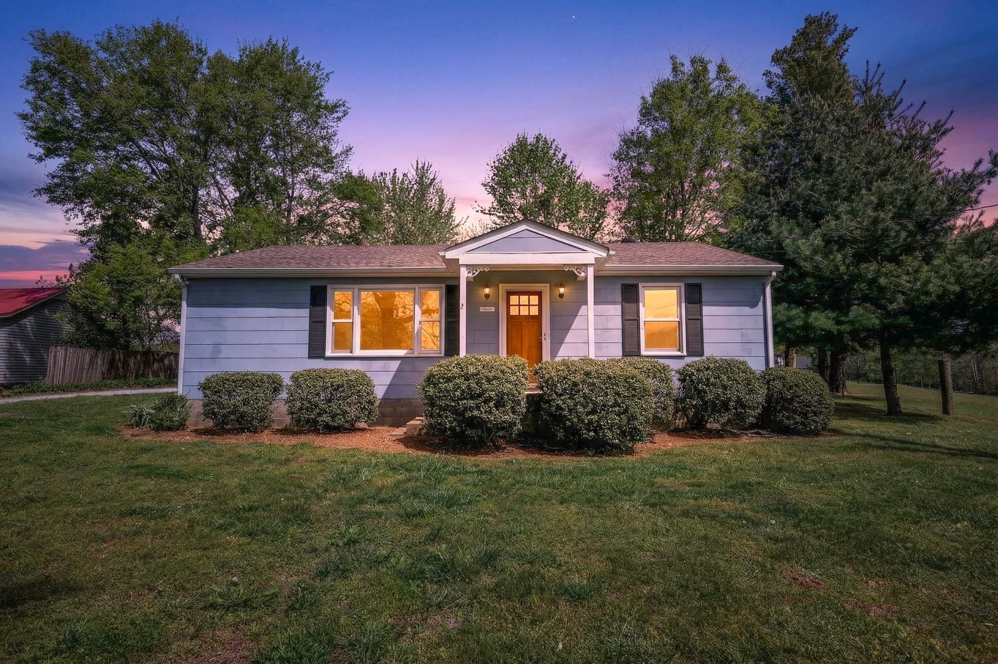 4676 Harpeth-Peytonsville Road Thompson's Station, TN 37179 - Photo 47 of 84 a front view of a house with a garden