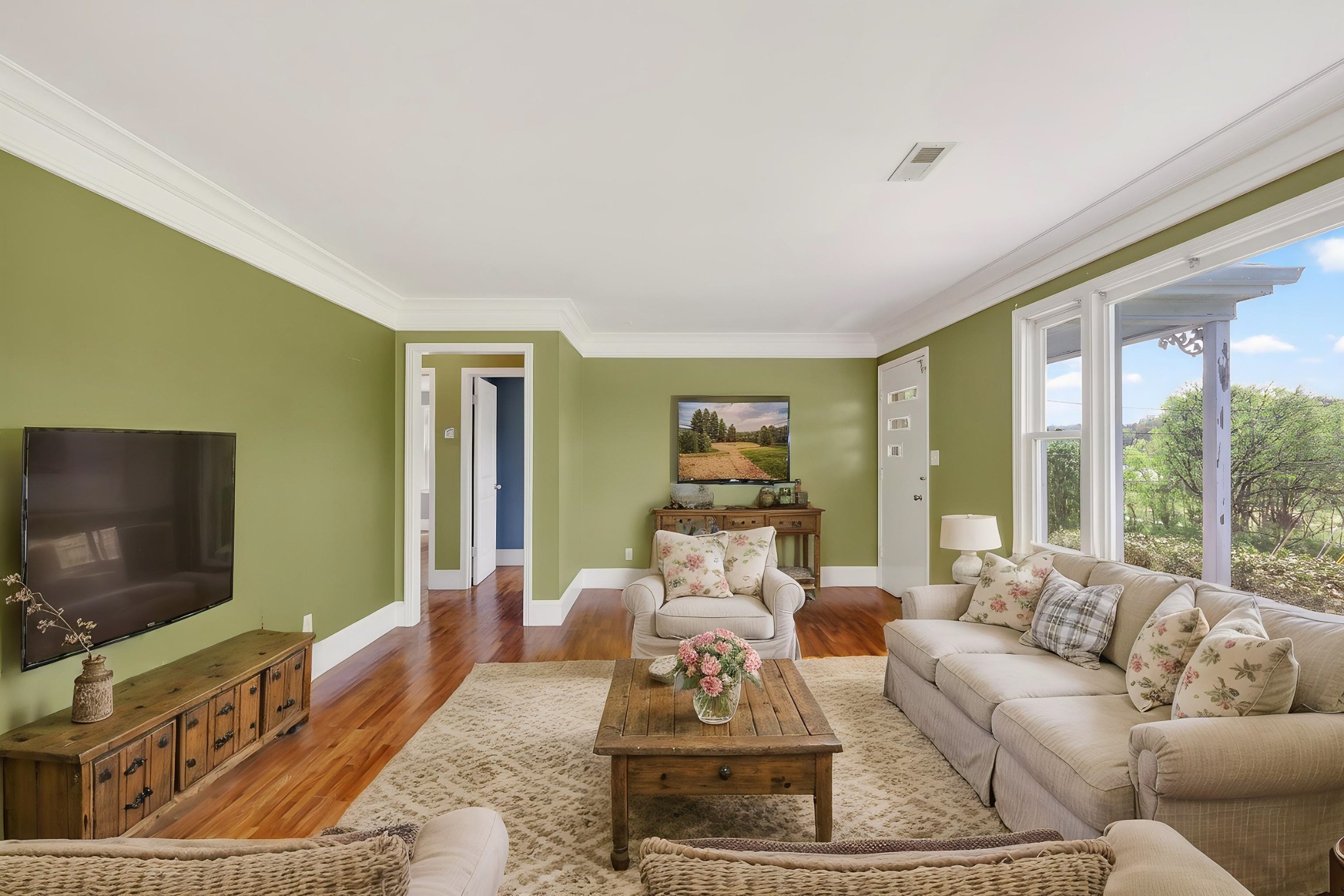 4676 Harpeth-Peytonsville Road Thompson's Station, TN 37179 - Photo 55 of 84 a living room with furniture and a flat screen tv