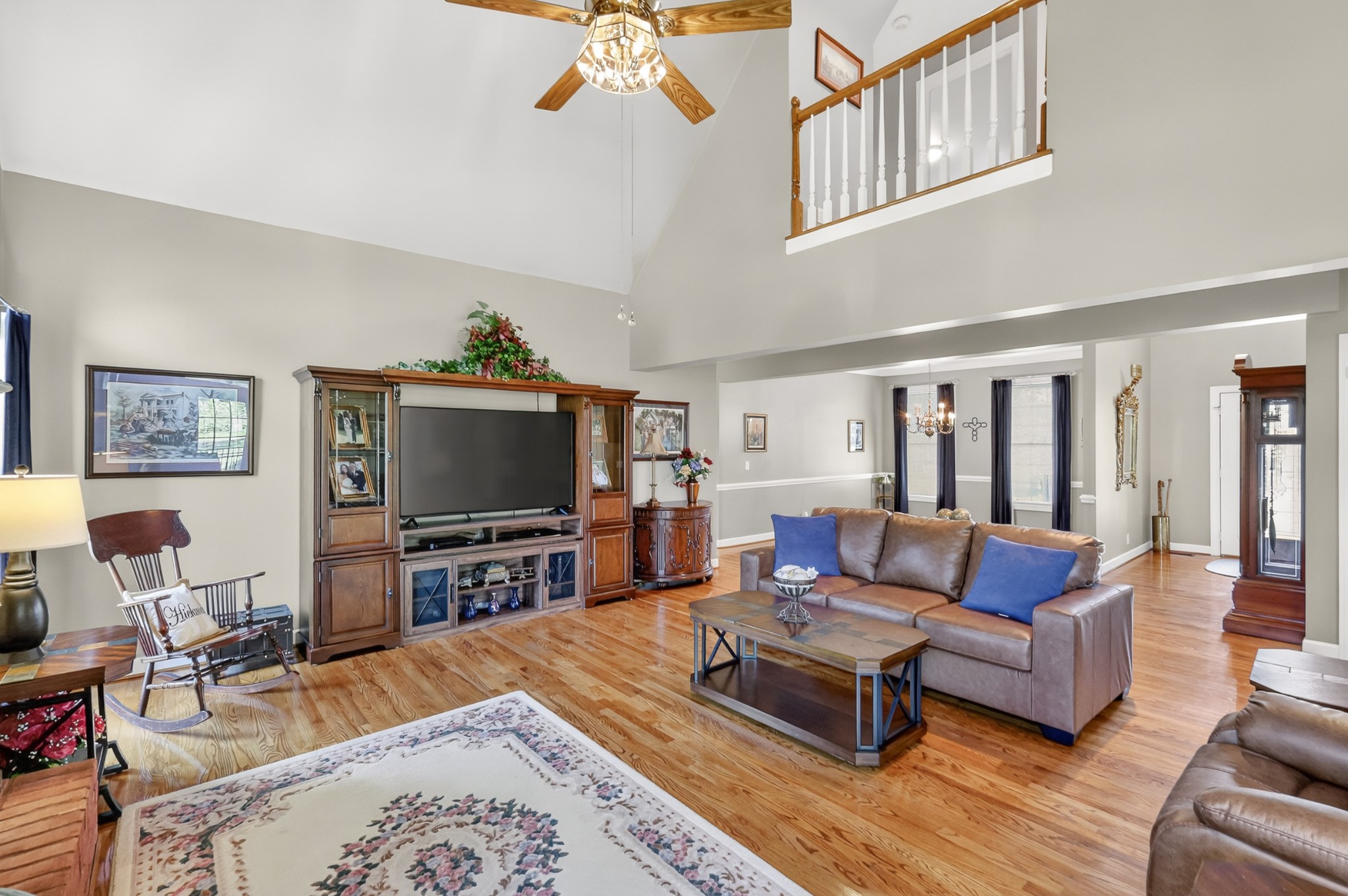 4676 Harpeth-Peytonsville Road Thompson's Station, TN 37179 - Photo 6 of 84 a living room with furniture and a flat screen tv
