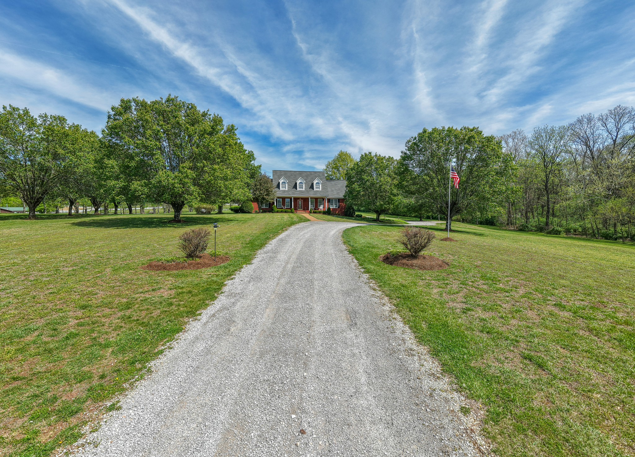 4676 Harpeth-Peytonsville Road Thompson's Station, TN 37179 - Photo 80 of 84 a view of a street with a yard