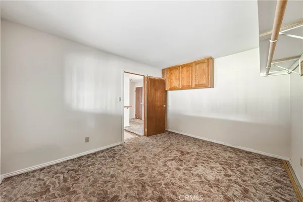 an empty room with closet