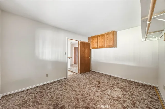 an empty room with closet