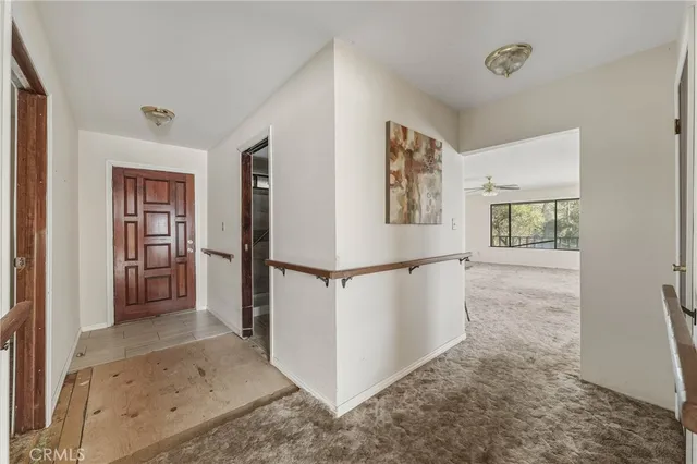 a kitchen with stainless steel appliances a sink and a refrigerator