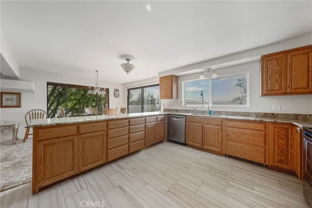 a view of an empty room with a ceiling fan