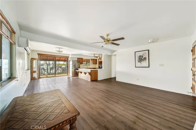 a view of a garage with wooden floor