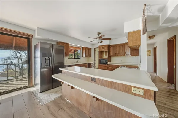 a view of empty room with wooden ceiling
