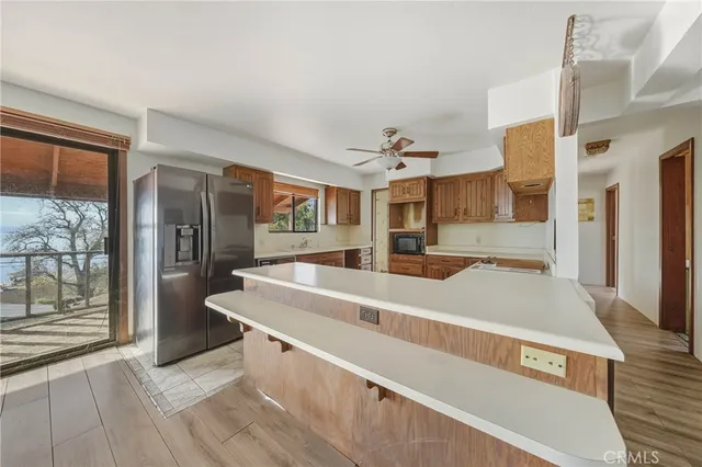a view of empty room with wooden ceiling