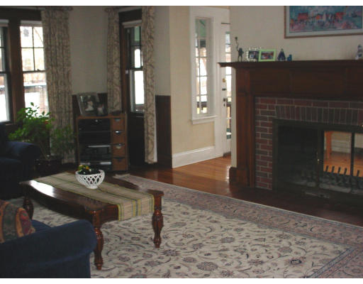 24 Stuart Road Newton, MA 02459 - Photo 3 of 11 a living room with furniture and a fireplace