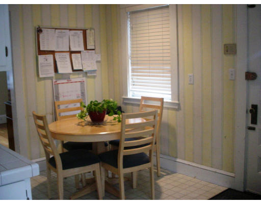 24 Stuart Road Newton, MA 02459 - Photo 6 of 11 a view of a dining room with furniture and a potted plant