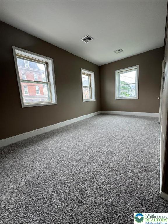 7 South Front Street, Unit A ( REAR) Coplay, PA 18037 - Photo 9 of 23 an empty room with windows