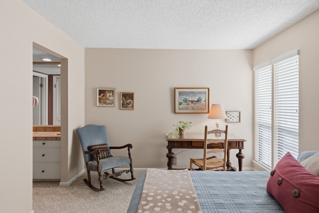 3500 Enfield Road, Unit E Austin, TX 78703 - Photo 26 of 40 The bedroom is spacious enough to accommodate a seating area.