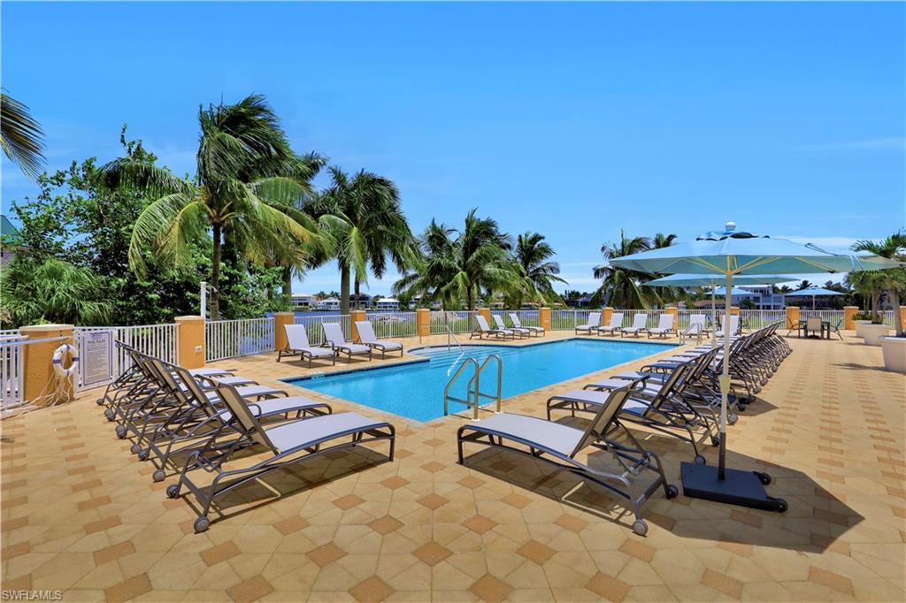 460 Launch Circle, Unit 202 Naples, FL 34108 - Photo 21 of 27 Pool deck behind RI currently under constrution.