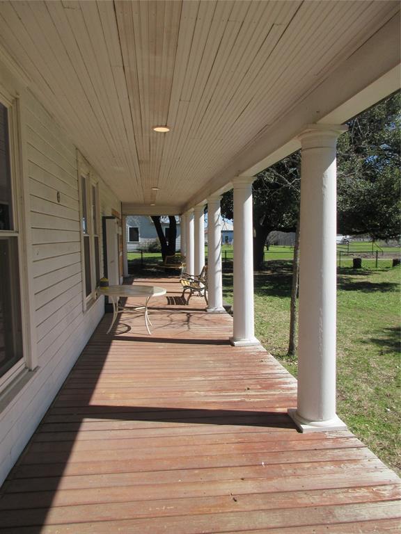 607 1st Street Rosebud, TX 76570 - Photo 4 of 29 a view of a house with porch and furniture