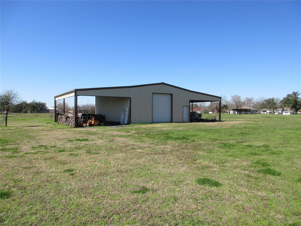 607 1st Street Rosebud, TX 76570 - Photo 7 of 29 a house view with a outdoor space
