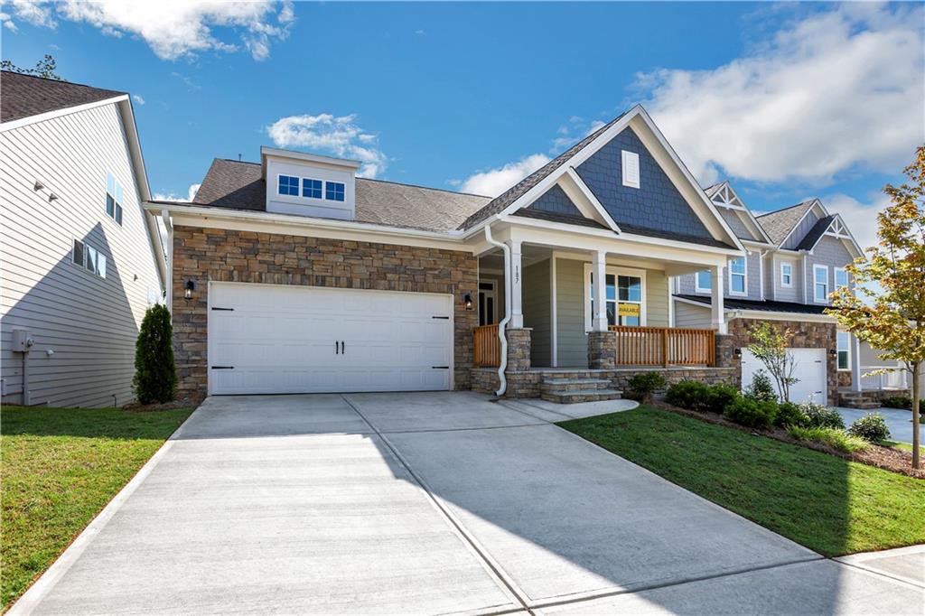 187 Sunshower Ridge Canton, GA 30114 - Photo 1 of 1 a front view of a house with a yard