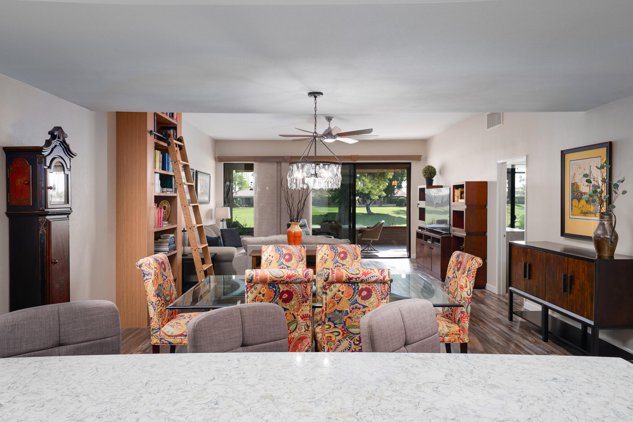 6 Sunrise Drive Rancho Mirage, CA 92270 - Photo 12 of 48 a living room with fireplace furniture and a large window
